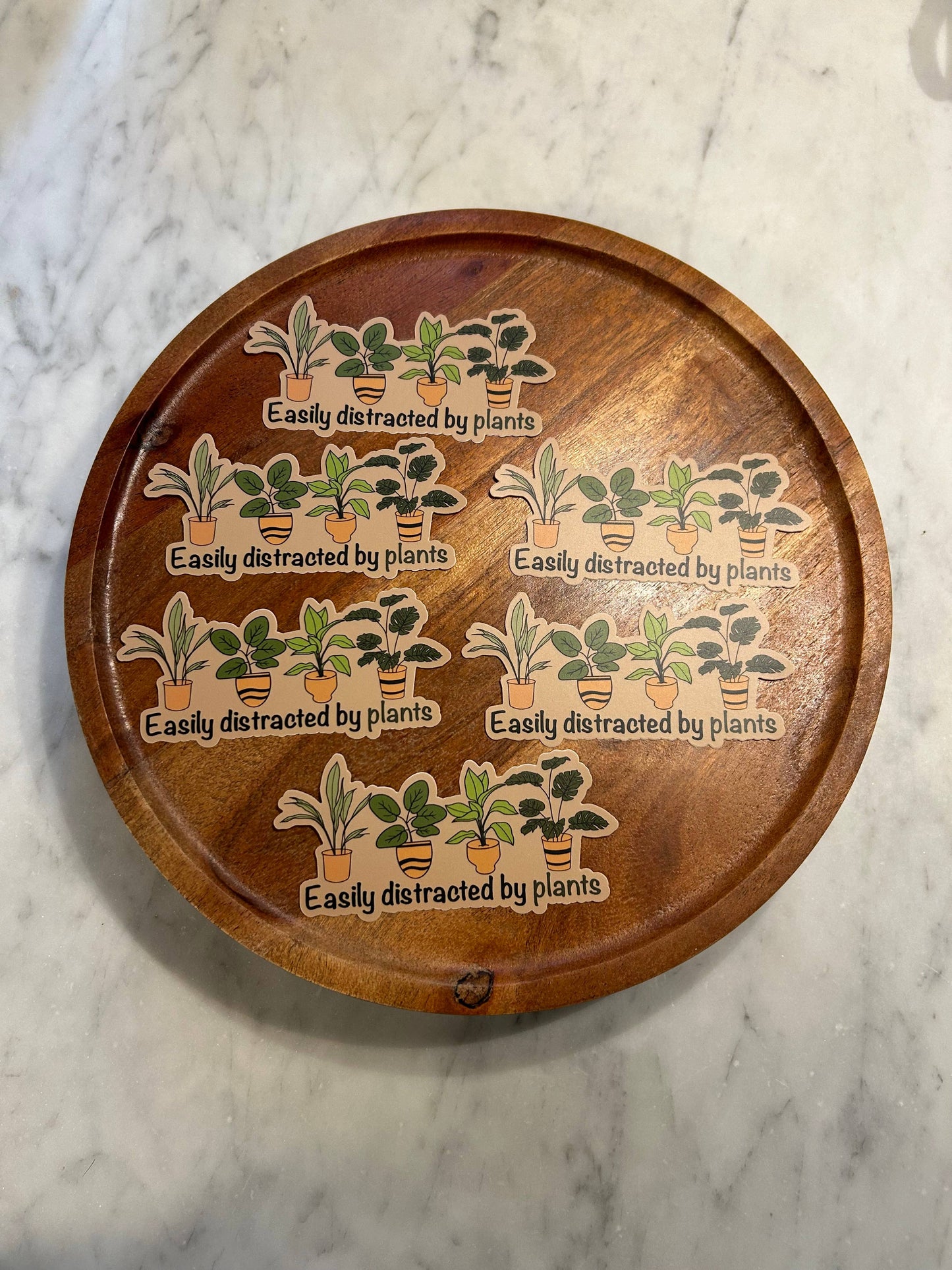 Easily distracted by plants sticker • brown