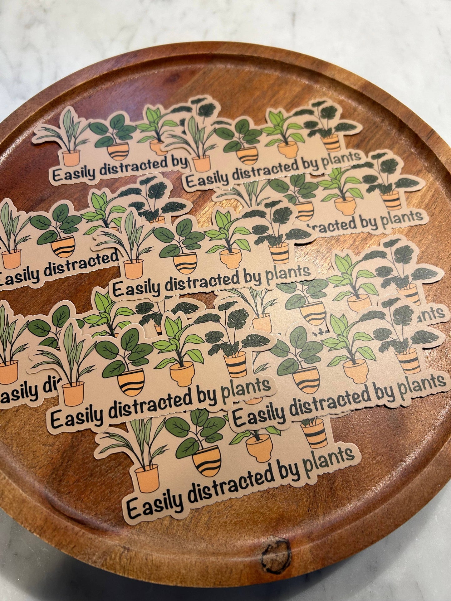 Easily distracted by plants sticker • brown